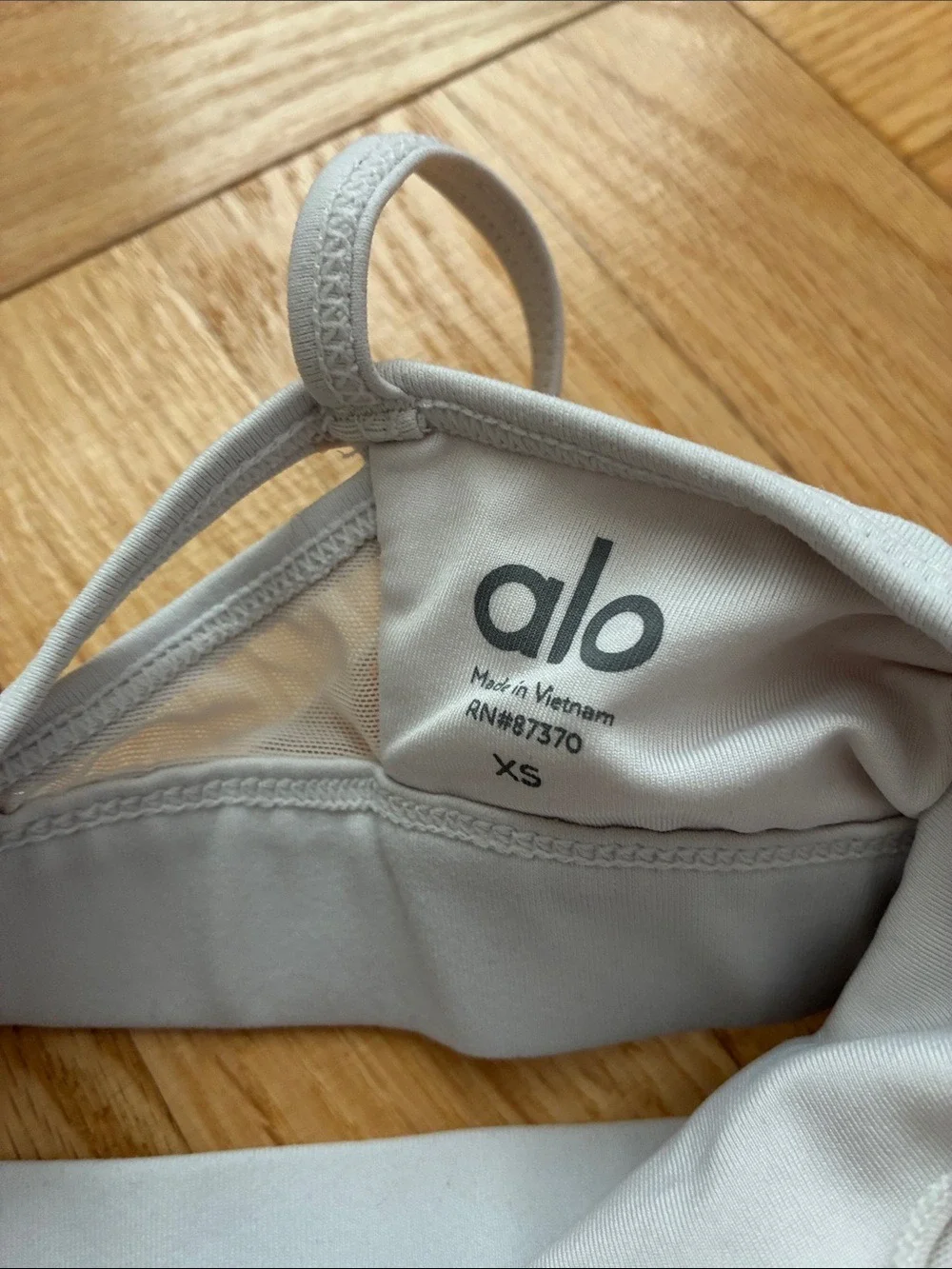 ALO Yoga White Sports Bra with Black Logo